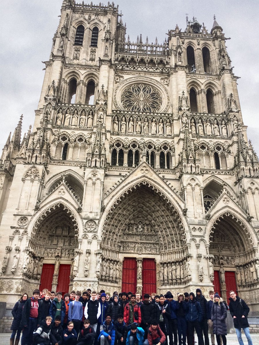 Student and teacher group shot outside cathedral